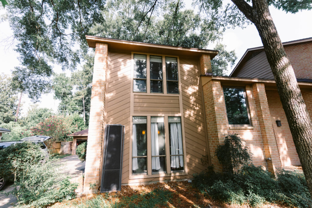 Two story home receiving professional window cleaning services in Houston, TX
