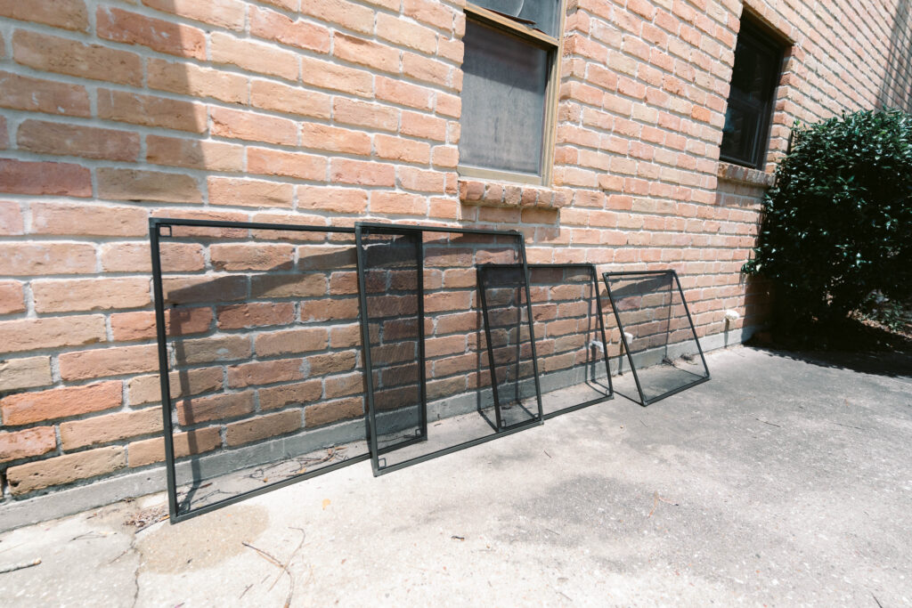 Window screens removed before professional window cleaning in Houston, TX