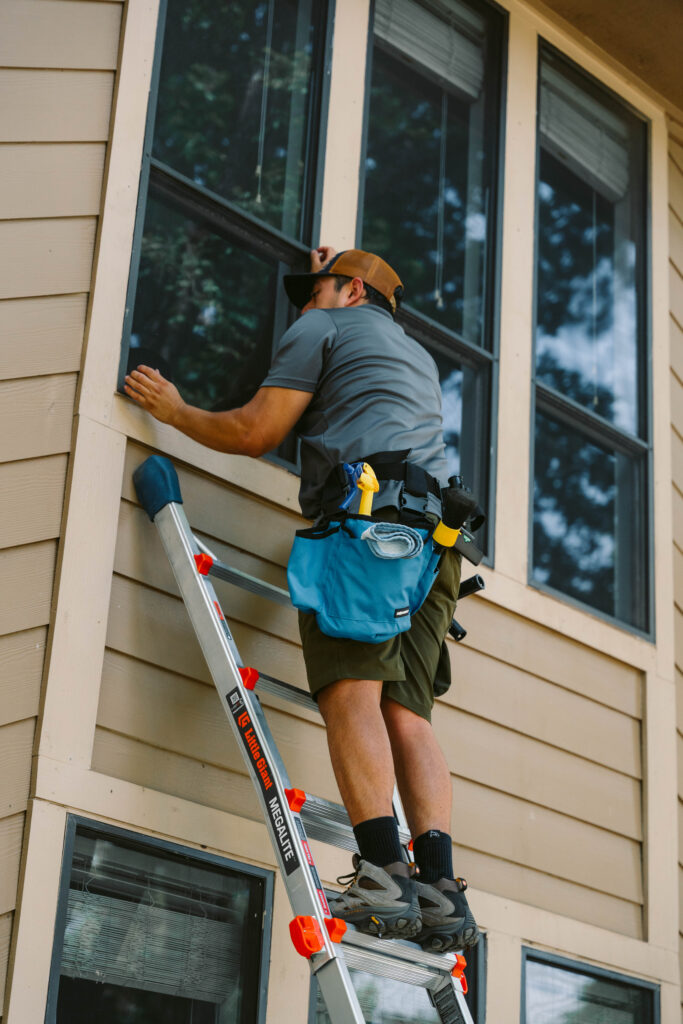 Detailed window track cleaning performed during residential window cleaning service in Houston, TX.